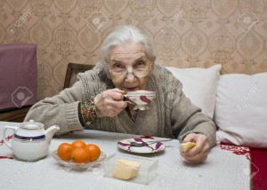 12844809-Old-lady-European-drinking-tea-at-home--Stock-Photo